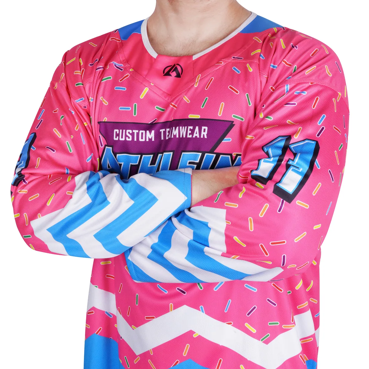 Pink ATHLEIN hockey jersey with blue and white sleeve stripes and colorful printed details